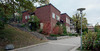 Stockholm, Bredäng, Nordens Vänner 3, Odd Fellowvägen 19-63, 26-38. F d skolbyggnadens ursprungliga personalbostadsbyggnad från syd.



