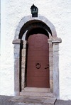 Sydportalen. Observera årtalet "1923" i dörrens smide, det år då portalen restaurerades.