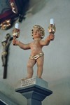 Ljusbärande kerub av Jonas Ullberg på predikstol i Härja kyrka. Neg.nr. 04/194:24. JPG.