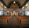Orgelfasaden härstammar från 1863, verket från 1912. Läktarunderbyggnaden tillkom 1988.