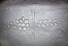 Detalj från motiv ristade i kyrkorummets väggar