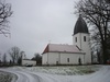 Östra Eds kyrka och f d sakristian från nordöst.