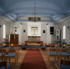Kyrkan har flera inventarier från Bergsjöns vandringskyrka och Lillhagens kyrka.