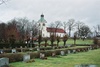 Starrkärrs kyrka och kyrkogården, från SV.
