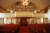 Västra delen av kyrkorummet med orgelläktaren.