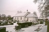 Sibbarps kyrka och kyrkogårdens sydöstra del.