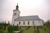 Kyrkan och kyrkogårdens södra del.