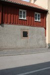 Schougska handelgården, svalgångslängan: fasad mot Vinbergsgatan, bottenvåningen av sten i byggnadens nordöstra del.