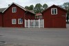 Waldenströmska gården, gårdshusens gavlar mot Norra Långgatan. Till höger hantverkslängan , till vänster magasinsbyggnaden.