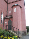 Nynäshamns kyrka, tornet med sitt trapphus, ingång till torntrappan och sakristian