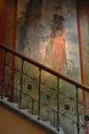 Trappräcke i smide, på väggen "Vikingatidens kvinna" målning i Carl Larssons svit "Den svenska kvinnan genom seklen". 
