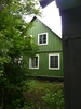 Hustoftagården. Bostadshusets nordvästra gavel med blindfönster.