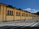 Södra Kasern. Sporthallen med fasad utmed Västra Storgatan..