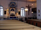 Kyrkorummet med koret sett från det tillbyggda långhuset från 1750-talet.