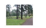 Den nya kyrkogården har delvis karaktären av skogskyrkogård. 