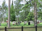 Parti av kyrkogården sett från kyrkvallen i öster.