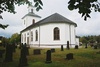 Ambjörnarps kyrka med omgivande begravningsplats, från SÖ.