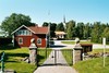 Homestads kyrka, hembygdsgård och folkskola, betraktad från kyrkogården i söder. Neg.nr 03/210:07.jpg