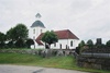 Torestorps kyrka med omgivande kyrkogård, från SÖ.