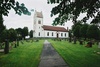 Öxabäcks kyrka med omgivande kyrkogård, från S.