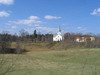 Vy över Dalhems kyrka från öster.