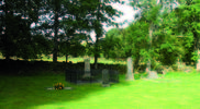 Gravvårdarna i sydvästra hörnet av kyrkogården