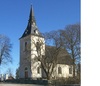 Skerike kyrka exteriör bild av kyrkan med långhus och västtorn.