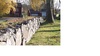 Kyrkogårdens äldre del närmast kyrkan omgärdas av en bogårdsmur i kallmurat förband, byggd av dalkarlar på 1840-talet. 