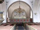 Orgeln från 1867 med läktarbarriär från 1700-talet placerades i norra korsarmen vid 
1950 års restaurering. 
