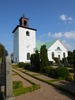 Fleninge kyrka, sedd från sydvästra hörnet av kyrkogården