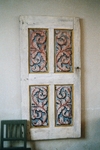 Tranums kyrka, dekormålad äldre dörr på långhusvägg . Neg.nr 03/138:07.