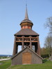 Mattmars kyrkogård, klockstapeln. 

Klockstapeln är byggd av den kände klockstapelbyggaren och byggmästaren Pehr Olofsson i Dillne, Oviken, 1765. Den har en fyrsidig bas i form av en bod med sadeltak av brädor. Tolv spåntäckta pelare bär upp klockbocken med balusterräcket och det övre taket som övergår i en åttkantig lökformad kupol med spåntak. Dörren i bottenvåningen är liksom balusterdockorna och kupolens bas målade mörkt gula. 