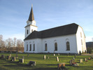 Torps kyrka med omgivande kyrkogård, vy från nordväst. 