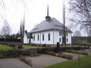 Torpshammars kyrka med omgivande kyrkogård. Vy från nordväst.