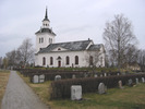 Haverö kyrka med omgivande kyrkogård, vy från sydöst. 