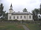 Hemsö kyrka med omgivande kyrkogård, vy från sydöst. 