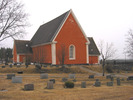 Sånga kyrka med omgivande kyrkogård/kyrkotomt, vy från nordväst. 