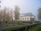Ytterlännäs nya kyrka med omgivande kyrkogård, vy från sydöst. 