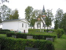Ullåkers kyrka med omgivande kyrkogård samt gravkapellet, vy från nordöst.