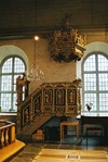 Predikstolen är ett verk av Michael Schmidt, inköpt till kyrkan år 1751. 