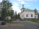 Trehörningsjö Kyrka med omgivande kyrkogård, vy av kyrkan från öster.