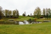 Håjums begravningsplats har karaktären av en skogskyrkogård kring kapellkrematoriet. På kullen till vänster i bild är en minneslund.