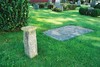 Söder om kyrkan ligger några äldre gravhällar som ursprungligen funnits inne i kyrkan och intill dessa finns en s k solvisare.