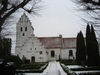 Burlövs kyrka och kyrkogård från söder.