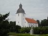 Mjällby kyrka och kyrkogård från sydväst.