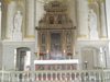 Mjällby kyrka, altaruppsats och korvägg med dekormålning.