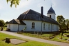 Långhuset och sakristian på Västra Tunhems kyrka fick sin form kring 1740 och tornet uppfördes 1810 med påbyggning 1912.