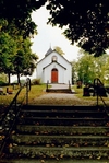 Trappor leder upp till vapenhuset i Väne-Ryrs kyrka.