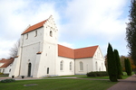 Ivetofta kyrka med romanskt västtorn och långhus och korsarmar uppförda på 1850-talet