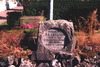 Minnesten i kyrkogårdsmuren väster om kyrkan över hedersmannen P A Larsson.